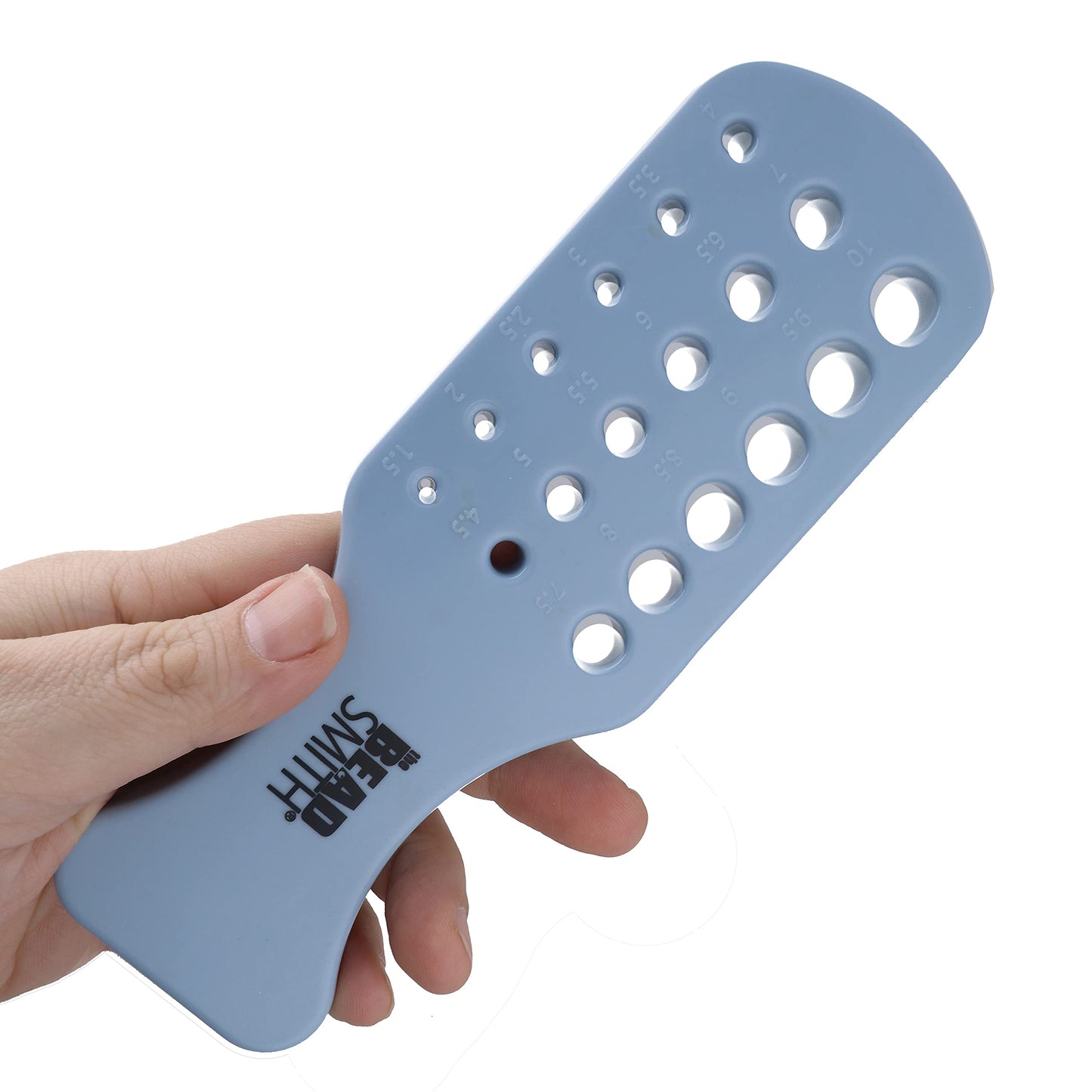 Bead Smith gauge showing sizing holes from 1.5 to 10mm, used for jewelry making and crafting.