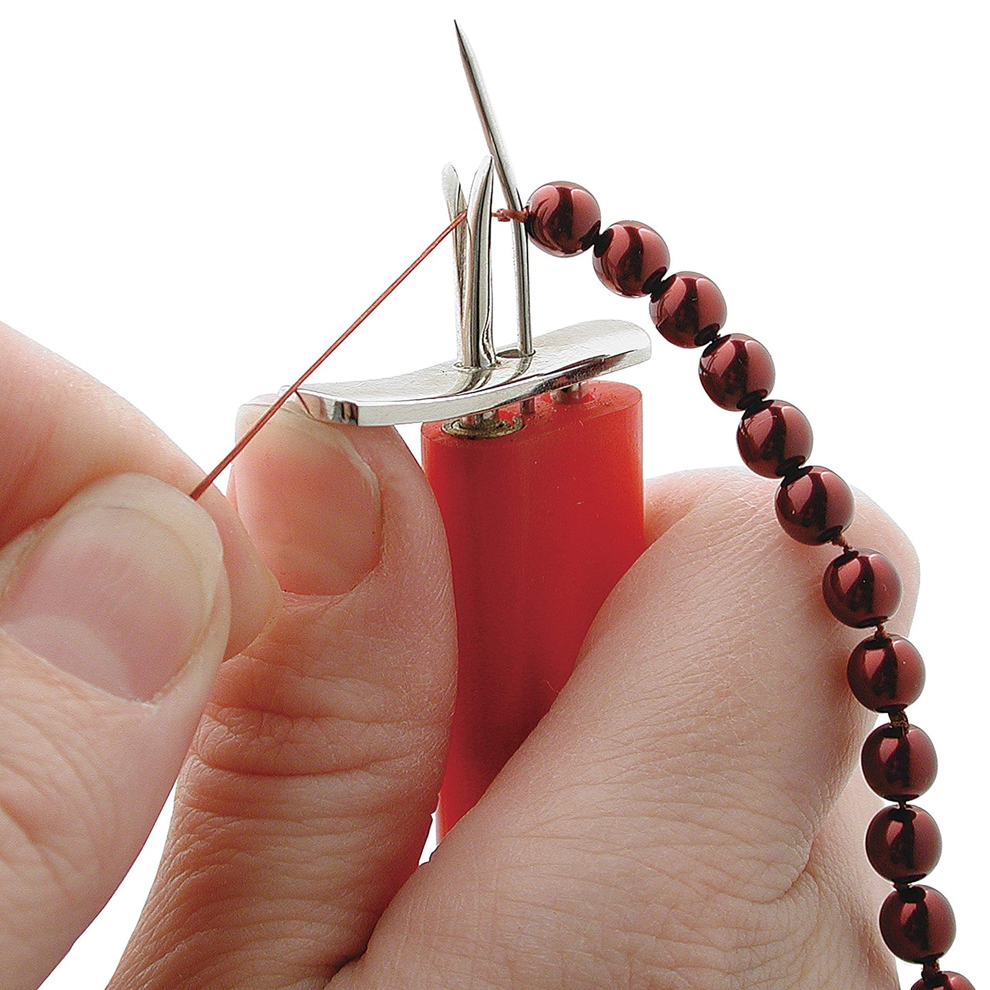 Beadalon Bead Stringing Tool with burgundy beads being strung with thread.