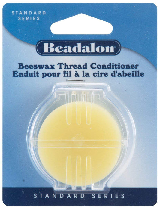 Beadalon Beeswax Thread Conditioner. Yellow beeswax in a clear plastic case. Useful for sewing and needlework.