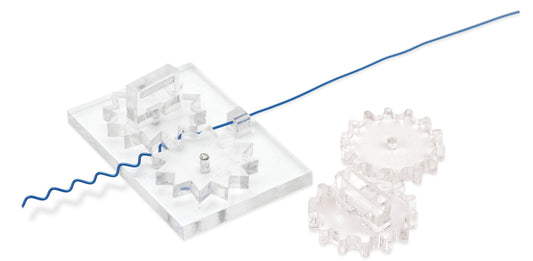 Close-up of a clear acrylic gear set with a blue wire demonstrating mechanics.